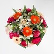 This Millbank bouquet offers a lively orchestration of colour and form, making it an ideal companion for life's happiest celebrations. Vivid orange gerberas command the centre, radiating optimism and warmth lent added dimension by sumptuous magenta carnations and gentle blush roses that cluster nearby. Their soft, plush petals invite touch, enhancing the intimate, tactile experience of the bouquet. Accents of snowy white alstroemeria and sprays of petite daisies weave through the arrangement, imparting a sense of fresh lightness reminiscent of early dawn over St John's Gardens. Lush, deep green leaves encircle the bouquet, framing the composition with a sense of abundant elegance while maintaining a natural, inviting balance. The colour palette remains perfectly harmonious; each hue flatters its neighbours in an artful blend that suggests both cheerfulness and refined taste. Prepared for birthdays, joyous milestones, or simply to bring Millbank's invigorating atmosphere indoors, the bouquet releases a gentle scent of blooming roses and subtle greenery, a gift that celebrates renewal and heartfelt connection. Flower Delivery Millbank's commitment to local quality shines through in every freshly arranged stem, ready for doorstep delivery along Millbank's vibrant streets.